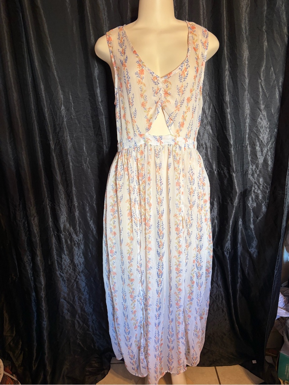 Sleeveless White Floral Sheer Maxi Dress with Peach and Blue Print